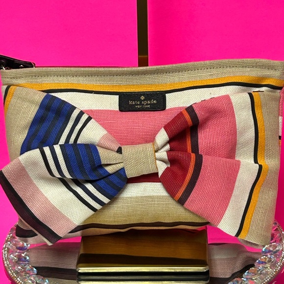 Kate Spade Handbags - Kate Spade Canvas Large Bow Wristlet Approx. 10 x 7